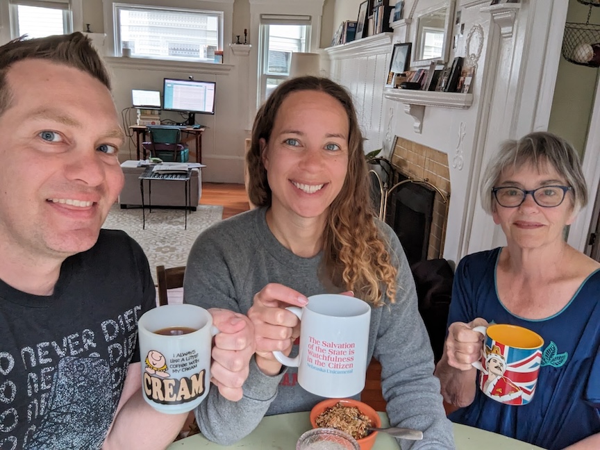 Me and two family members smiling, holding the coffee mugs discussed in the below blog post